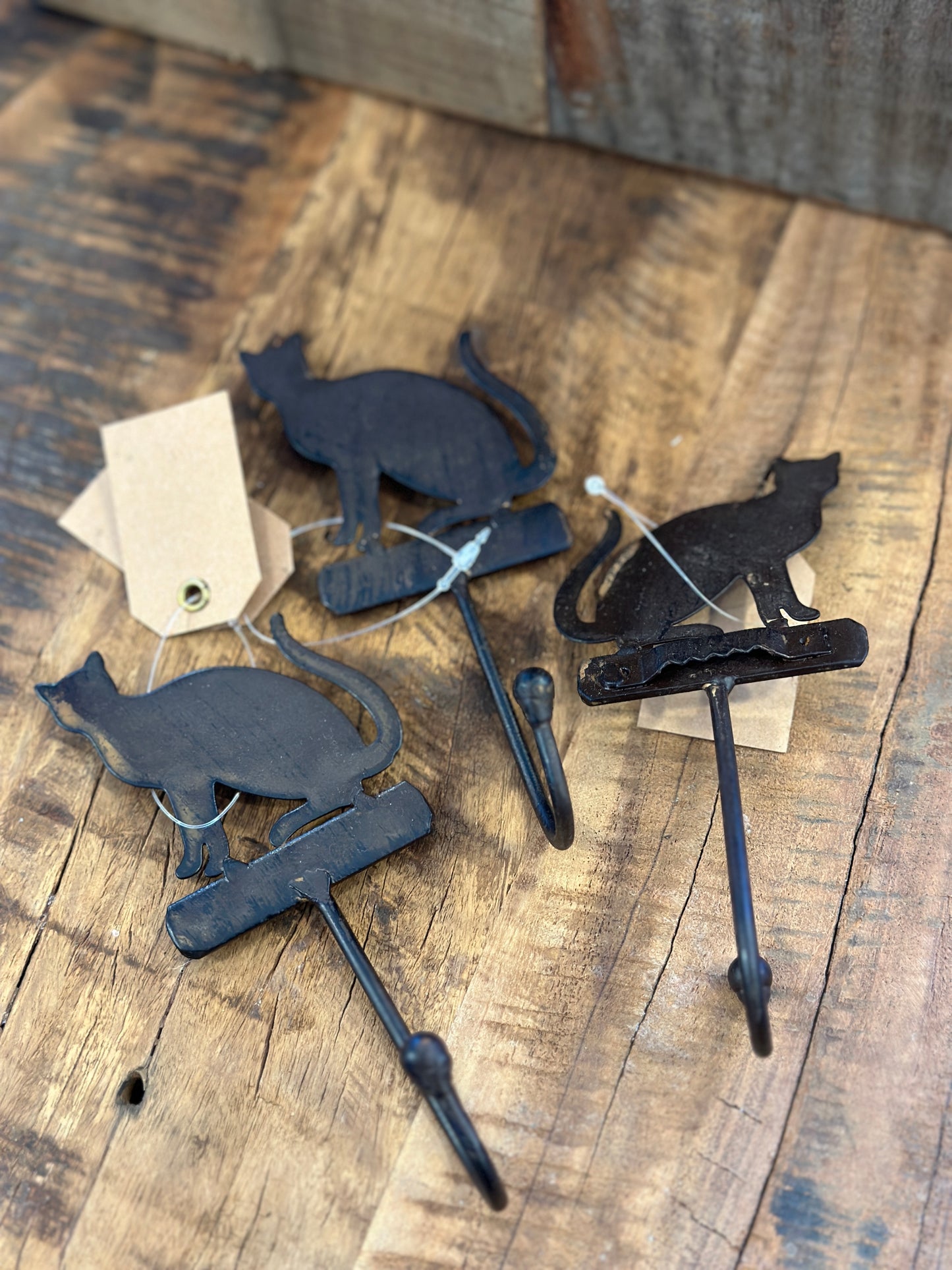 Haken, Katze aus Metall.