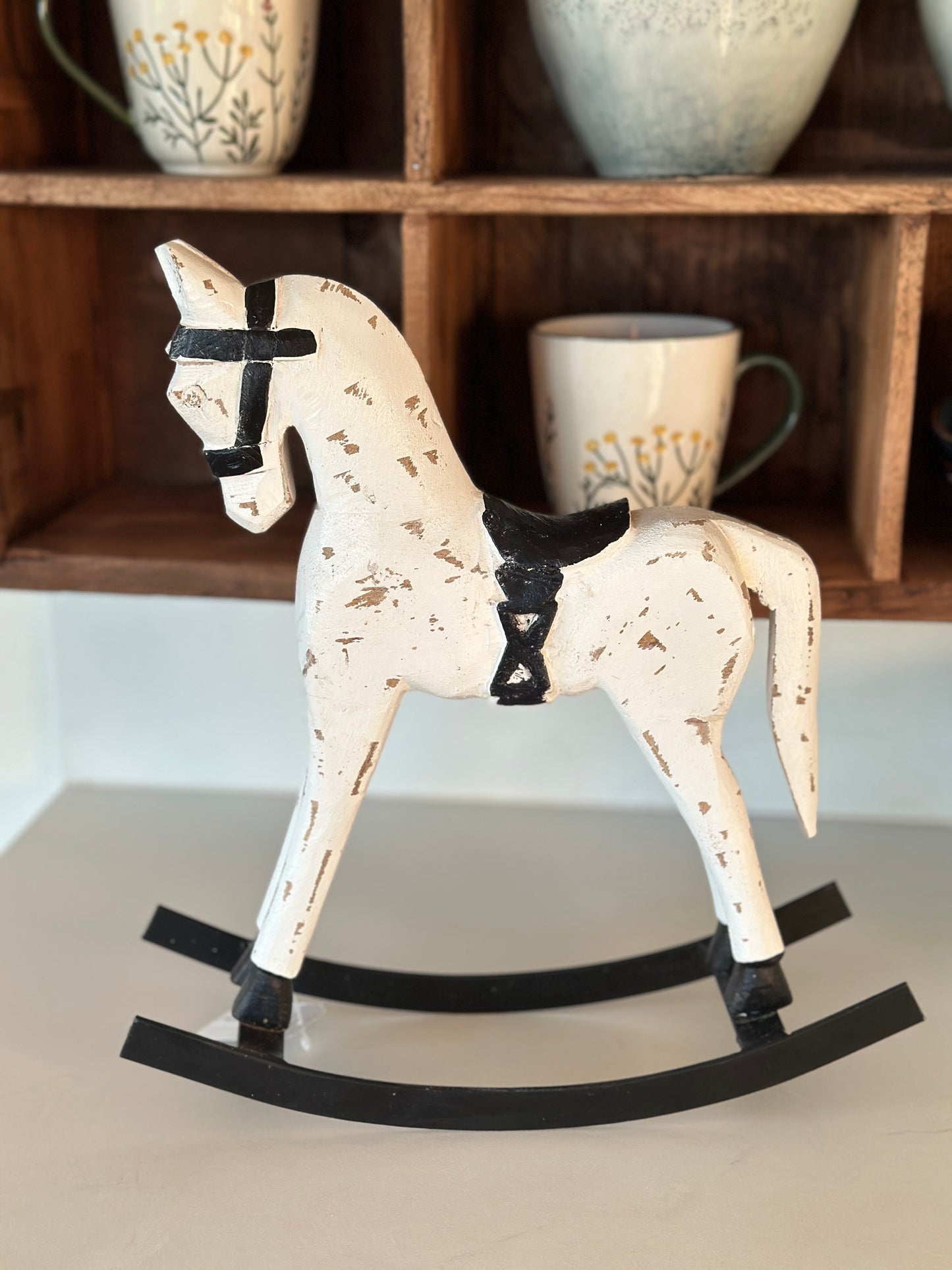 Schaukelpferd aus Holz und Metall